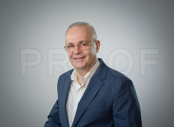 Corporate headshot - light gray
