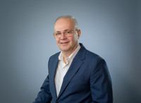 Corporate headshot - soft blue